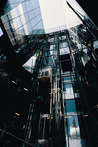 united kingdom low angle photography of curtain wall at daytime business